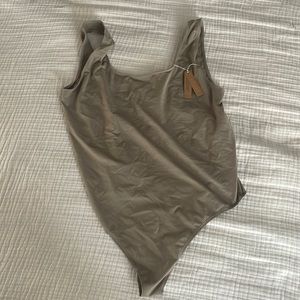 Skims SOFT SMOOTHING THONG BODYSUIT